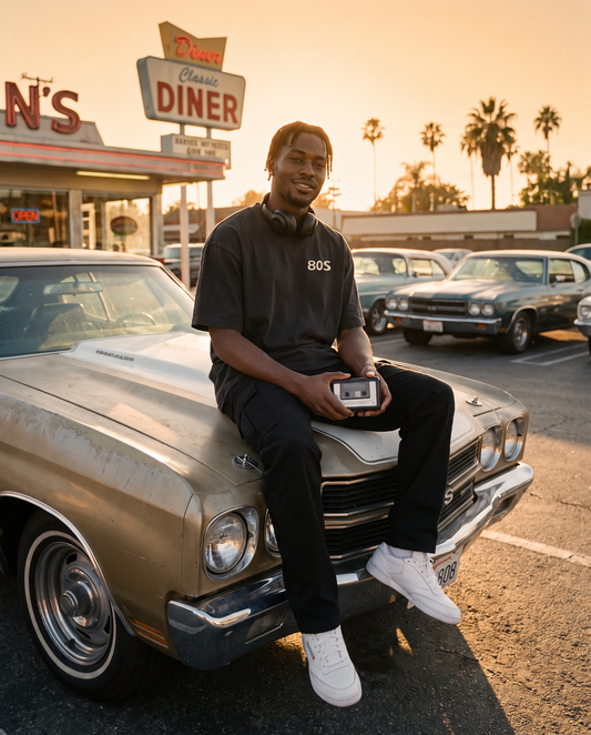 TAPE 1 oversized faded tee worn in a retro diner parking lot
