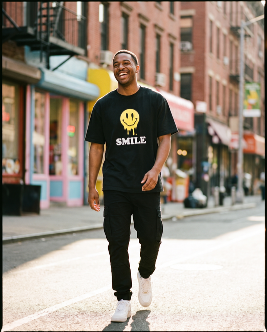 SMILE garment-dyed heavyweight tee worn on a sunny city street