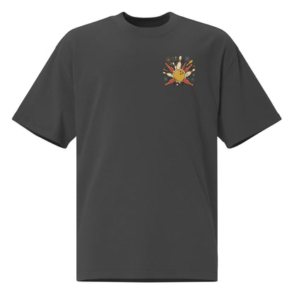 Strike oversized faded tee in black, front view with retro bowling graphic